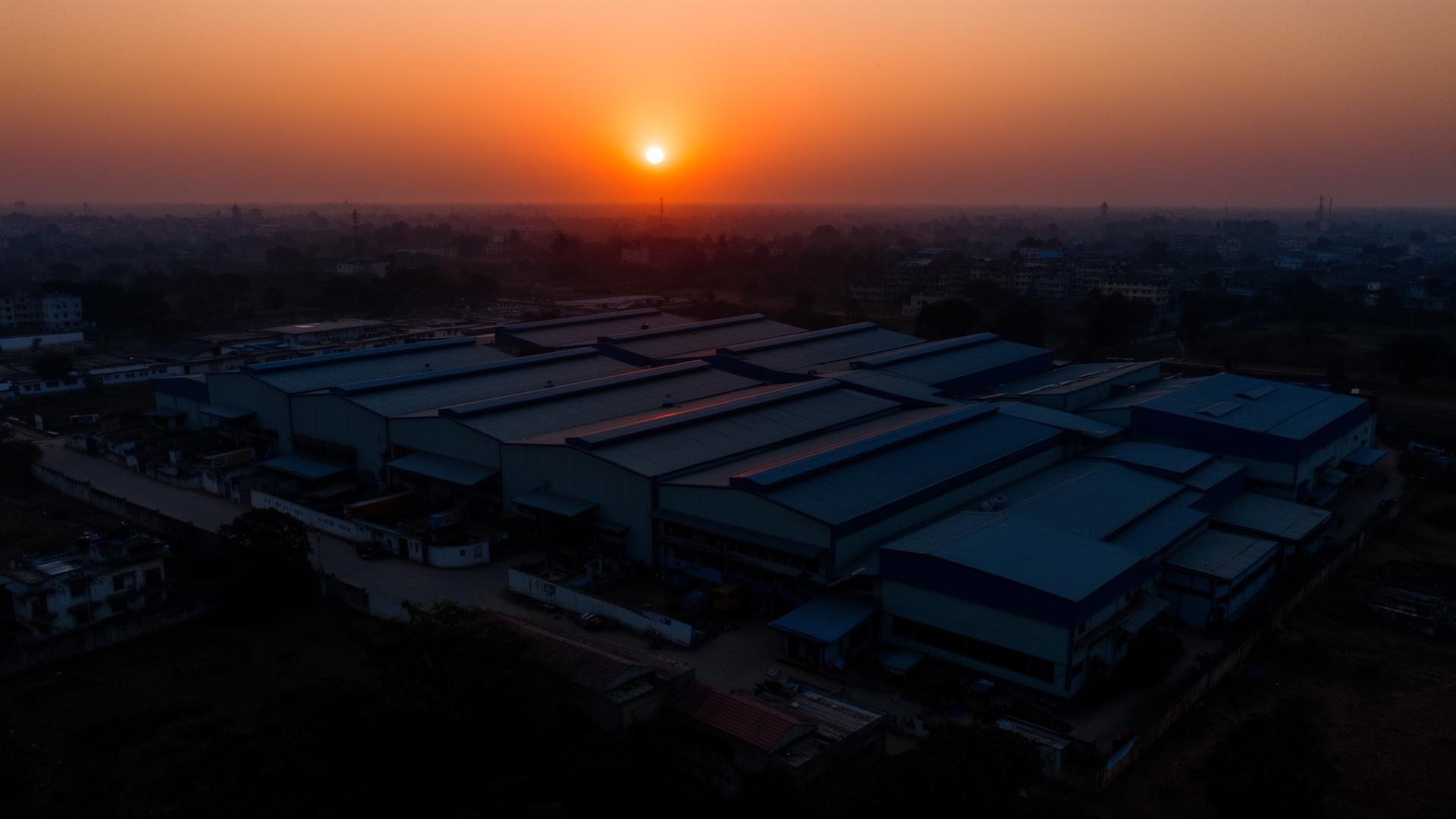 Aerial view of an Indian industrial corridor at golden hour